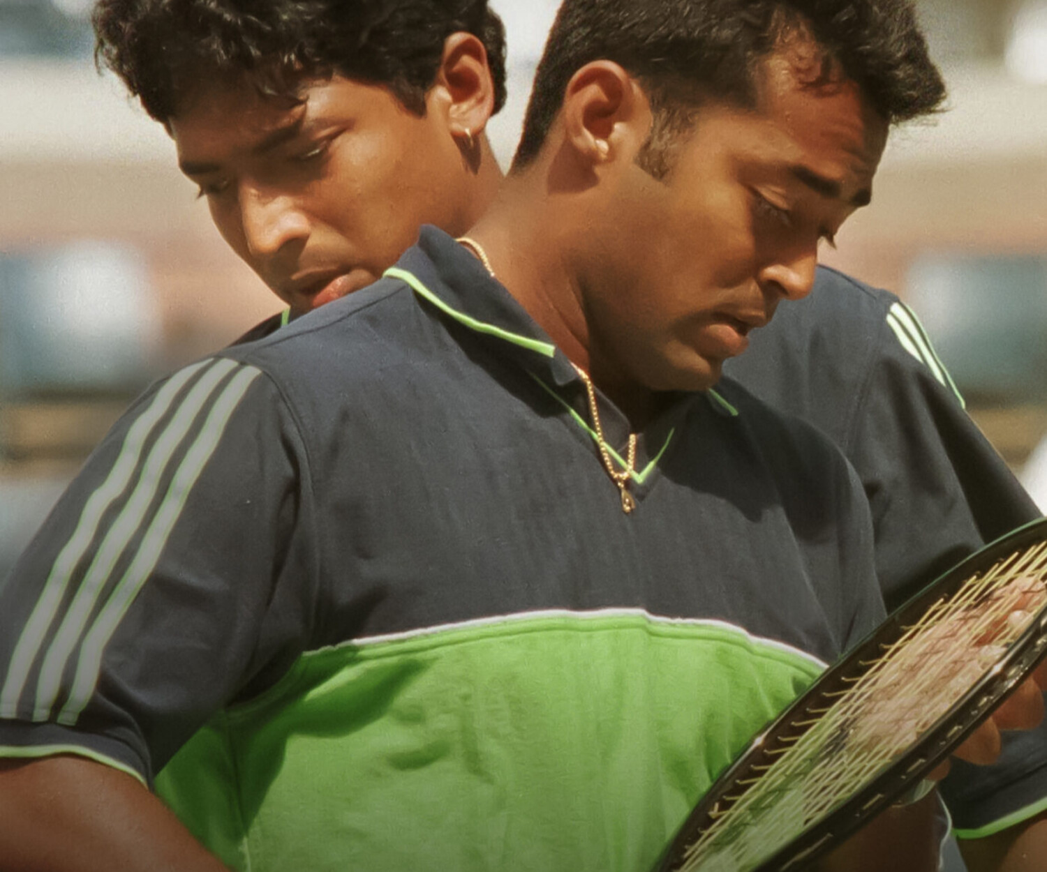 Leander Paes (front) and partner Mahesh Bhupathi of India cross paths during their mens doubles semi-finals match 09 September at the US Open in Flushing Meadows, NY. AFP PHOTO/Timothy A. Clary (Photo by Timothy A. CLARY / AFP) (Photo credit should read TIMOTHY A. CLARY/AFP via Getty Images)